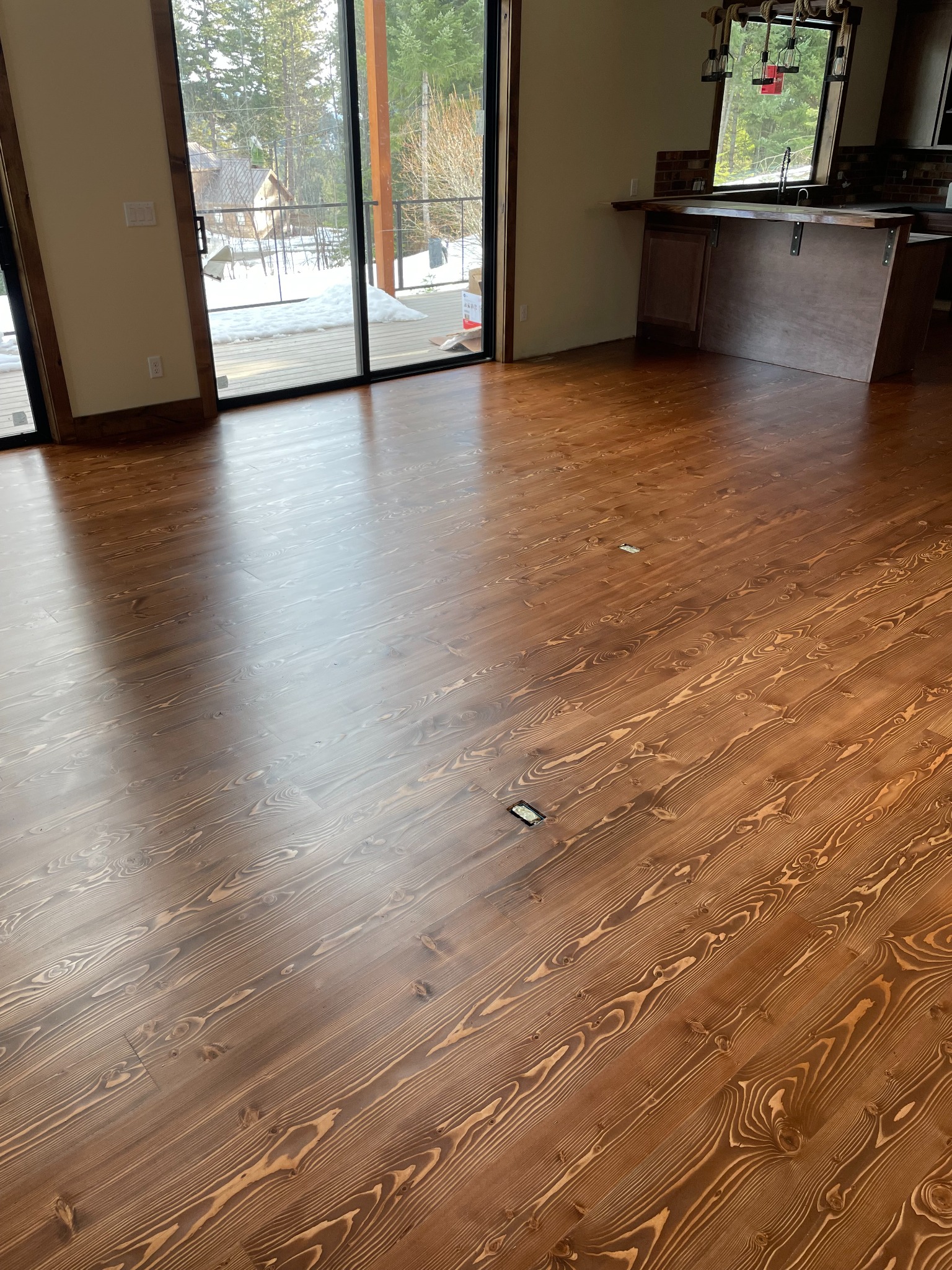 Rustic wide-plank brown floor